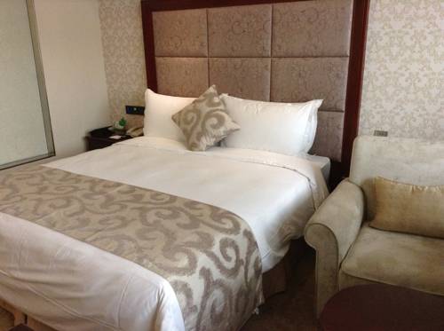 Imagen de la habitación del Hotel Shenzhen Yijia International. Foto 6
