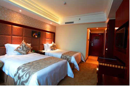 Imagen de la habitación del Hotel Shenzhen Yijia International. Foto 9