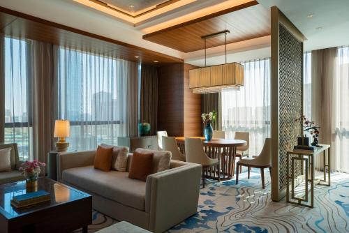 Imagen de la habitación del Hotel Sheraton Beijing Lize. Foto 3