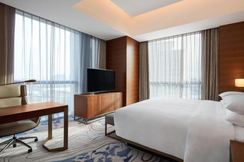 Imagen de la habitación del Hotel Sheraton Beijing Lize. Foto 4