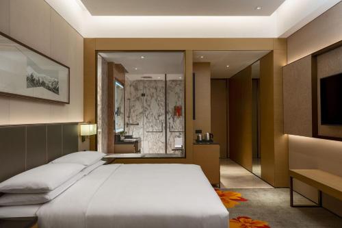 Imagen de la habitación del Hotel Sheraton Beijing Lize. Foto 5