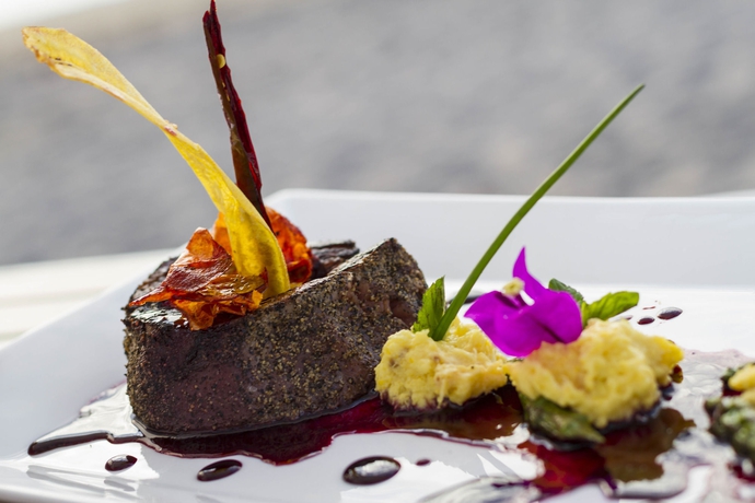 Imagen del bar/restaurante del Hotel Sheraton Buganvilias Resort and Convention Center. Foto 3