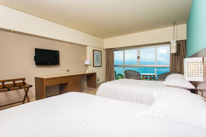 Imagen de la habitación del Hotel Sheraton Buganvilias Resort and Convention Center. Foto 16