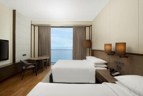 Imagen de la habitación del Hotel Sheraton Cebu Mactan Resort. Foto 13