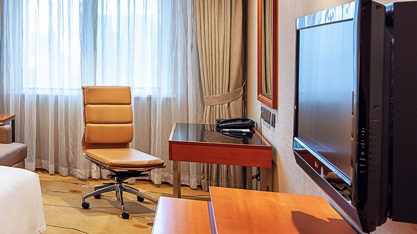 Imagen de la habitación del Hotel Sheraton Chengdu Lido. Foto 6