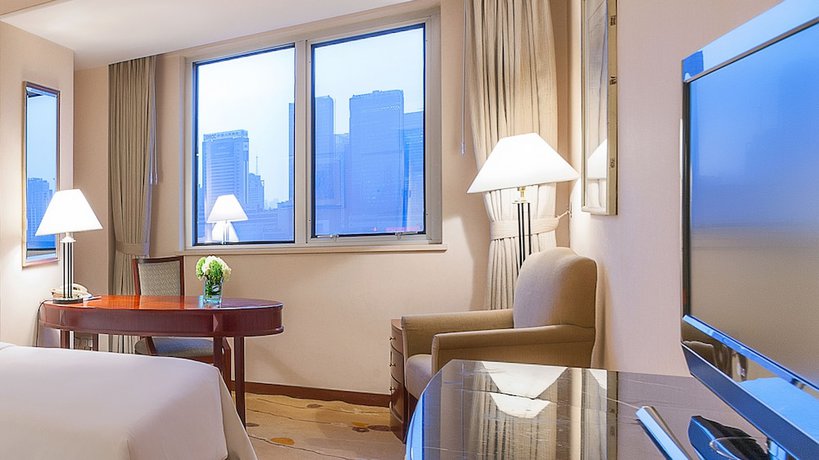 Imagen de la habitación del Hotel Sheraton Chengdu Lido. Foto 8