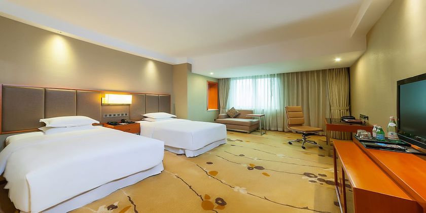 Imagen de la habitación del Hotel Sheraton Chengdu Lido. Foto 12