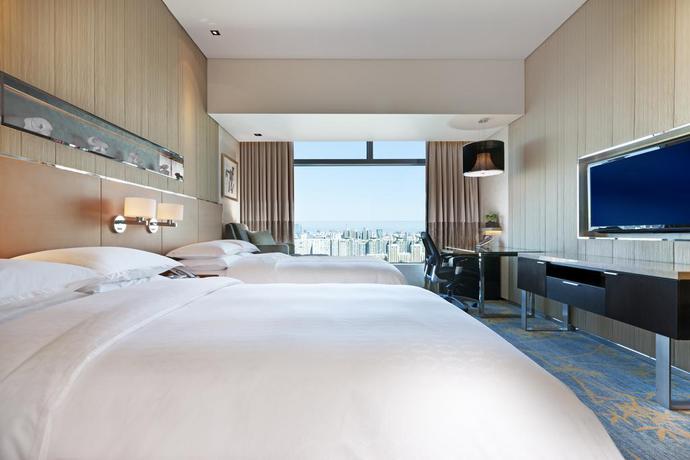 Imagen de la habitación del Hotel Sheraton Grand Beijing Dongcheng. Foto 15