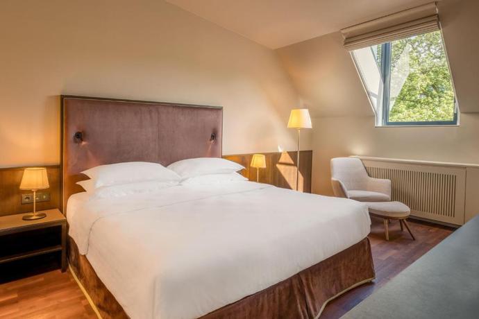 Imagen de la habitación del Hotel Sheraton Grand Salzburg. Foto 11