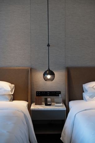 Imagen de la habitación del Hotel Sheraton Grand Xiamen Jimei. Foto 3