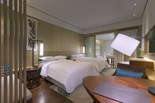 Imagen de la habitación del Hotel Sheraton Grand Xishuangbanna. Foto 8