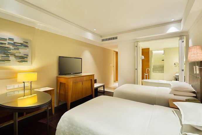 Imagen de la habitación del Hotel Sheraton Haikou. Foto 14