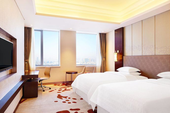 Imagen de la habitación del Hotel Sheraton Harbin Xiangfang. Foto 17