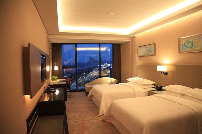 Imagen de la habitación del Hotel Sheraton Huangdao. Foto 9