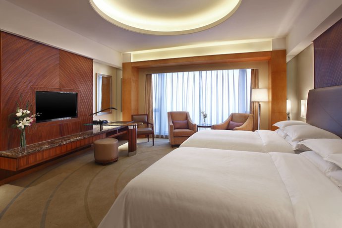 Imagen de la habitación del Hotel Sheraton Jinzhou. Foto 7