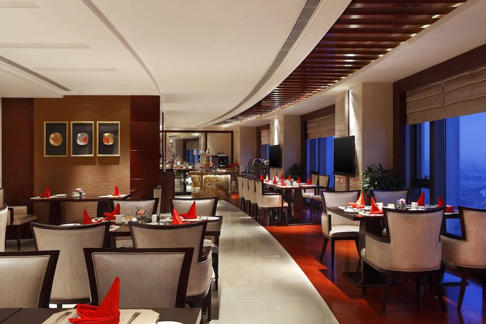 Imagen de la habitación del Hotel Sheraton Jinzhou. Foto 9