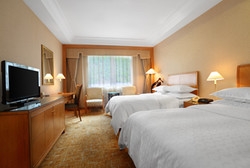 Imagen de la habitación del Hotel Sheraton Jiuzhaigou Resort. Foto 4