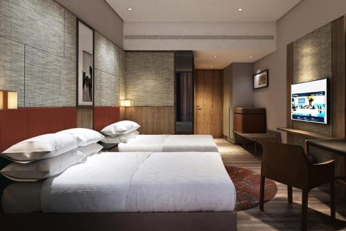 Imagen de la habitación del Hotel Sheraton Kuching. Foto 16