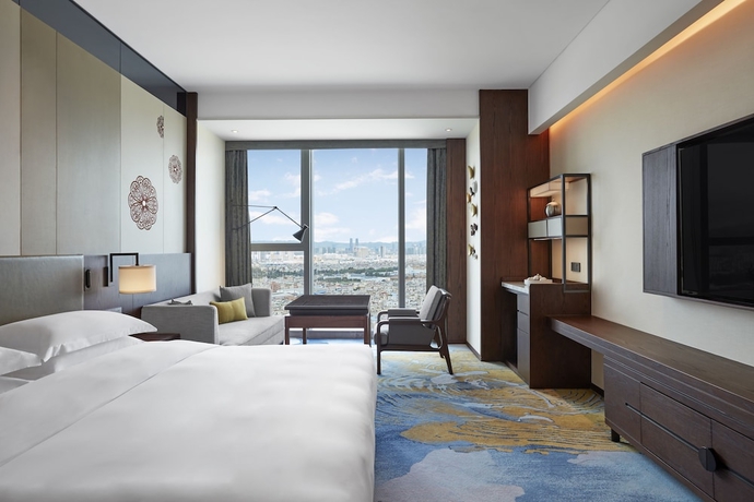 Imagen de la habitación del Hotel Sheraton Kunming. Foto 4