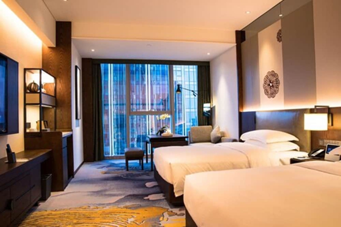 Imagen de la habitación del Hotel Sheraton Kunming. Foto 7