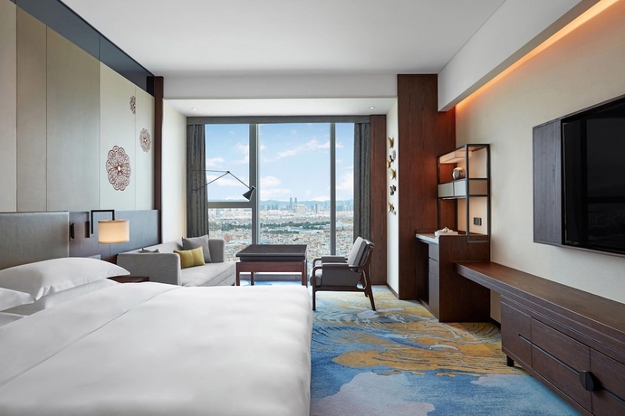 Imagen de la habitación del Hotel Sheraton Kunming. Foto 10