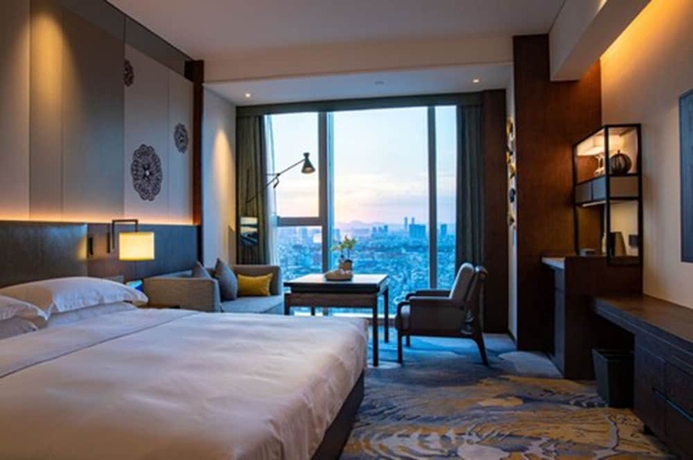 Imagen de la habitación del Hotel Sheraton Kunming. Foto 11