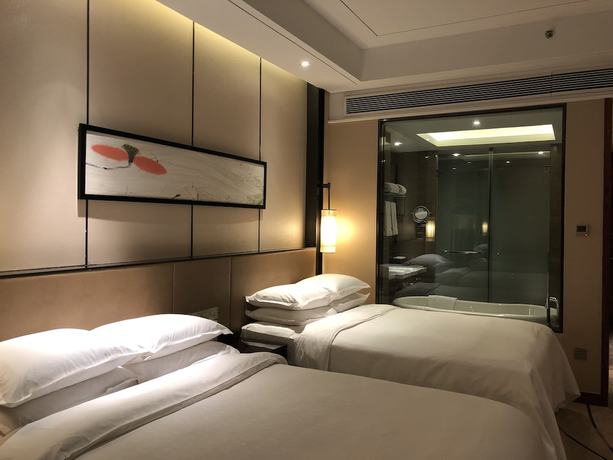 Imagen de la habitación del Hotel Sheraton Langfang Chaobai River Hotel. Foto 4