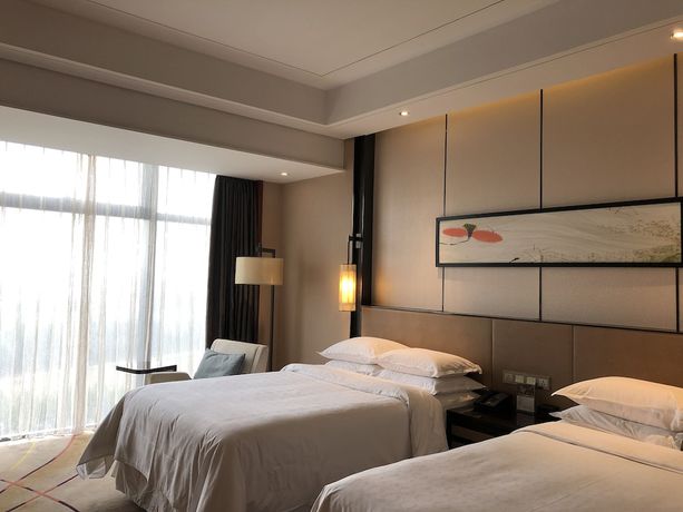 Imagen de la habitación del Hotel Sheraton Langfang Chaobai River Hotel. Foto 6