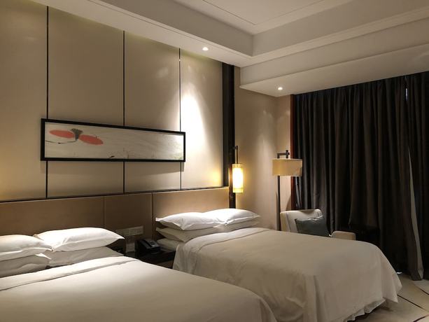 Imagen de la habitación del Hotel Sheraton Langfang Chaobai River Hotel. Foto 17