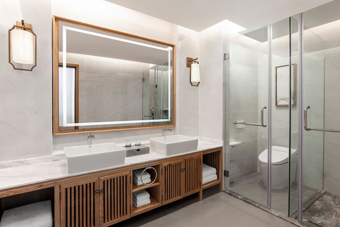 Imagen de la habitación del Hotel Sheraton Maoming Romantic Beach Resort. Foto 11