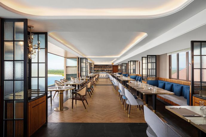 Imagen del bar/restaurante del Hotel Sheraton Maoming Romantic Beach Resort. Foto 2