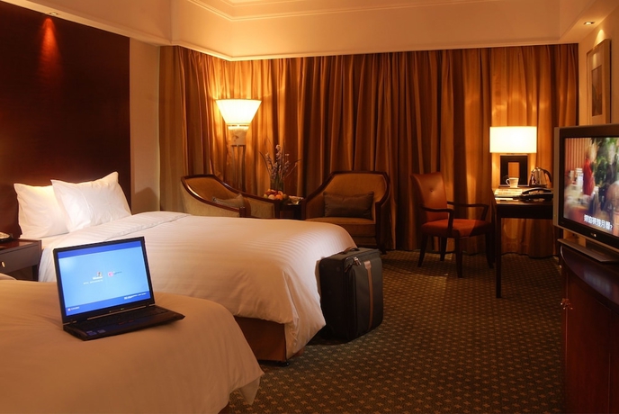 Imagen de la habitación del Hotel Sheraton Ningbo. Foto 11