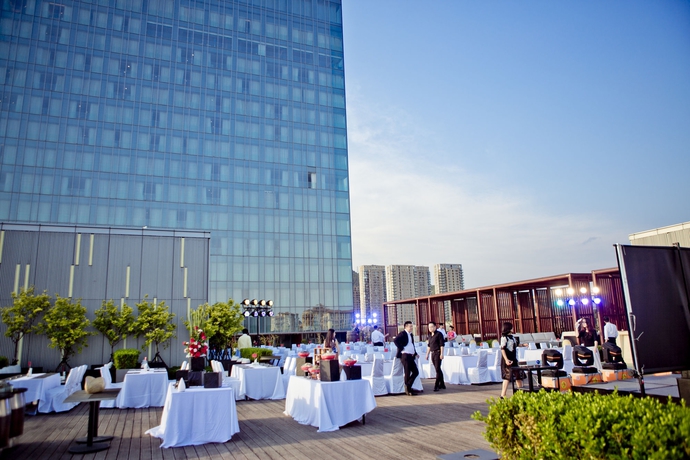 Imagen de los exteriores del Hotel Sheraton Qingdao Licang. Foto 10