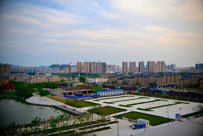 Imagen de los exteriores del Hotel Sheraton Qingdao Licang. Foto 11