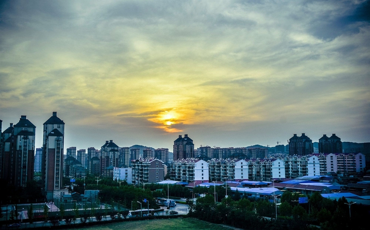 Imagen de los exteriores del Hotel Sheraton Qingdao Licang. Foto 12
