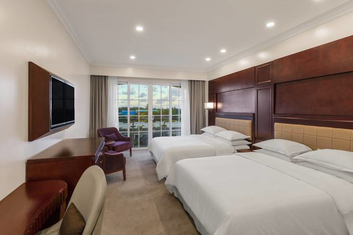 Imagen de la habitación del Hotel Sheraton Samoa Aggie Grey's and Bungalows. Foto 2