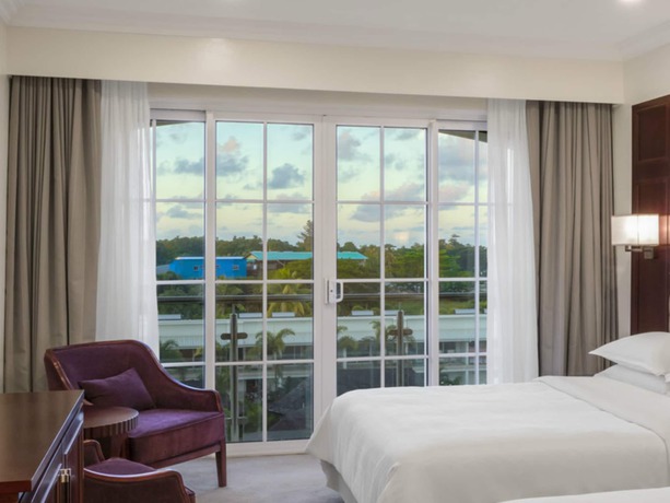Imagen de la habitación del Hotel Sheraton Samoa Aggie Grey's and Bungalows. Foto 3