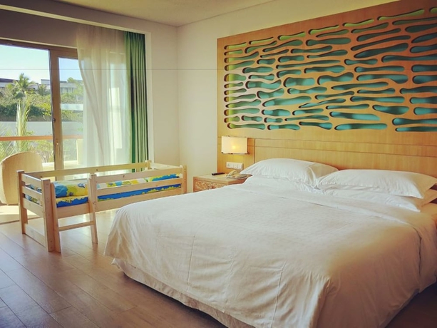 Imagen de la habitación del Hotel Sheraton Sanya Haitang Bay Resort. Foto 15