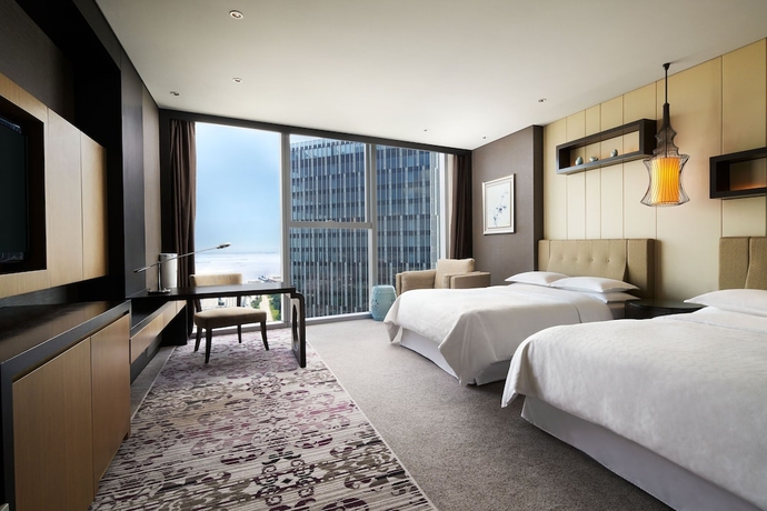 Imagen de la habitación del Hotel Sheraton Shanghai Waigaoqiao. Foto 6