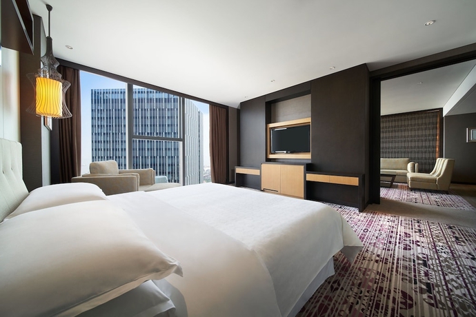 Imagen de la habitación del Hotel Sheraton Shanghai Waigaoqiao. Foto 10