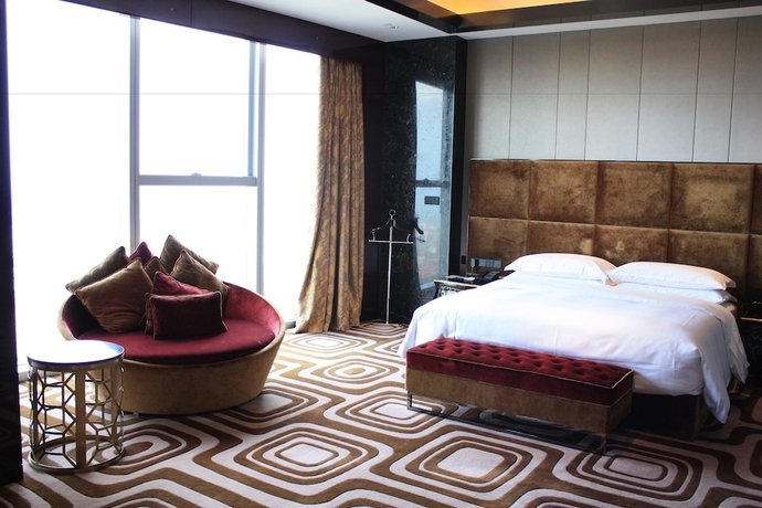 Imagen de la habitación del Hotel Sheraton Shanghai Waigaoqiao. Foto 17