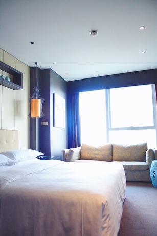 Imagen de la habitación del Hotel Sheraton Shanghai Waigaoqiao. Foto 18