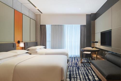 Imagen de la habitación del Hotel Sheraton Shenzhen Nanshan. Foto 4