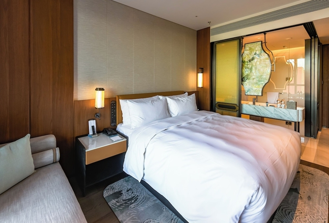 Imagen de la habitación del Hotel Sheraton Suzhou Yangcheng Lake. Foto 12