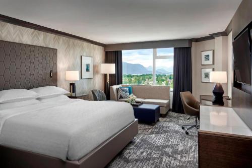 Imagen de la habitación del Hotel Sheraton Vancouver Guildford. Foto 11