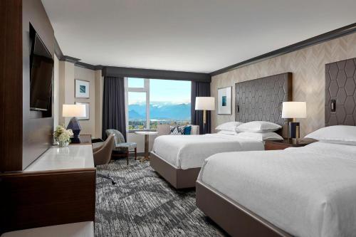 Imagen de la habitación del Hotel Sheraton Vancouver Guildford. Foto 12