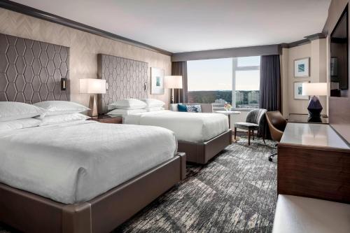 Imagen de la habitación del Hotel Sheraton Vancouver Guildford. Foto 19