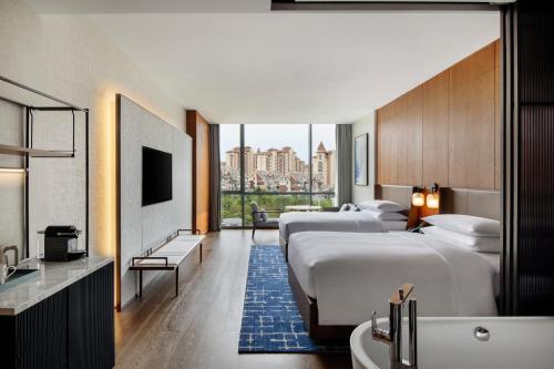 Imagen de la habitación del Hotel Sheraton Xuzhou. Foto 12