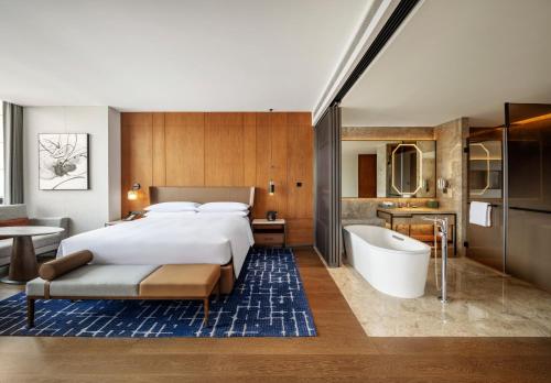 Imagen de la habitación del Hotel Sheraton Xuzhou. Foto 16