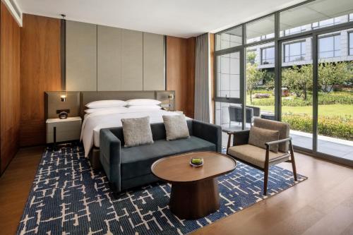 Imagen de la habitación del Hotel Sheraton Xuzhou. Foto 17